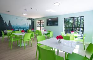 indoor wide shot of cafeteria table and chairs