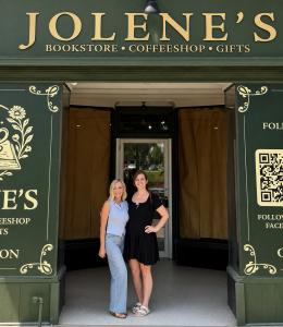 Shelli Netko and Megan Basinger standing together in front of Jolene's Bookstore in downtown Newark, Ohio.