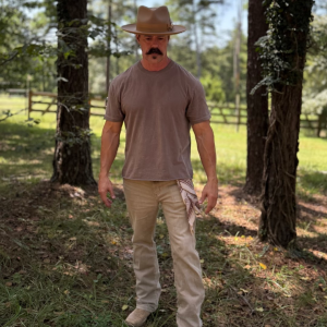 Chris Gowen, founder of Directional Force, wearing a western fedora and Wrangler jeans from his curated Amazon collection.