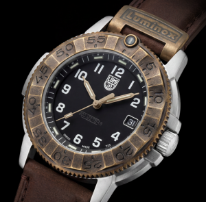 Close-up of the Luminox Adventure Watch 1300 Series with black dial, antique-bronze bezel, stainless steel case and brown leather strap.