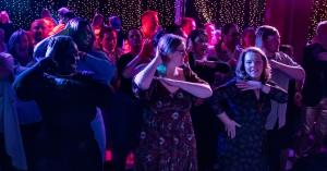 Guests dancing at Tony n' Tina's Wedding, a show that returned to Rio Hotel & Casino in Las Vegas.