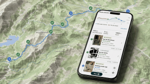 topo map with water sources along a route and a smartphone showing the droply water navigator screen