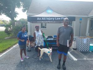 adopted dog with its new owners