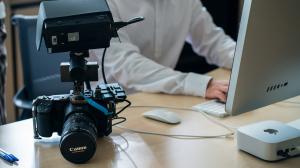 Professional camera setup and digital workstation at Wils Solutions in Vechelde, Germany, representing the company's combination of digital communication and technology.