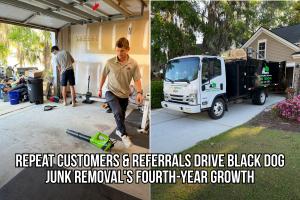 Black Dog Junk Removal team removing unwanted items from a garage with a branded junk removal truck at a Charleston-area home.