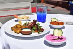 Trio of spreads with Grilled Spanish Octopus (Photo Credit: Hochman Marketing)