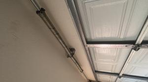 Emergency garage door spring replacement for a broken spring in Long Beach, CA.