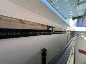 New garage door springs installed for broken spring repair in Long Beach, CA.