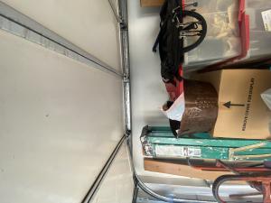 Garage door off-track and panel repair in Santa Clarita, CA.