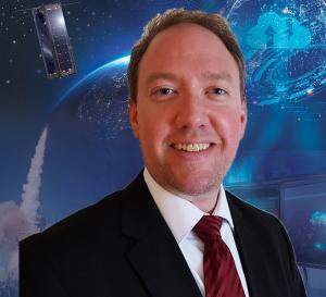 The image is a photo of Dr. Scott Zemerick who is TMC Technologies' Chief Engineer