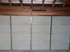Garage door spring repair service in Houston, TX.