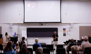 Taiwanese flutist Lin Hsiao-Feng demonstrating the Paiwan nose flute during a lecture at the World Flute Society Annual Convention.