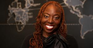 Portrait of Gail Mitchell, Executive Director of the Loc’d Life Foundation, promoting Chicago’s first Locs Festival at Kennedy-King College.