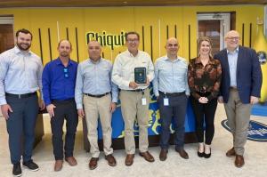 Chiquita and TA Dedicated celebrate 20 years of partnership. Right to left: Nathan Shultenover, Director of Operations, TA Dedicated; Marcus Russell, Ops Manager, TA Dedicated; Ruben Barahona,  Sr. Manager, Logistics, Chiquita; Manrique Bermudez, Director
