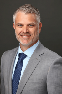 Professional headshot of the lead personal injury attorney at ReshLaw.