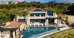 46 Deep Sea in Newport Coast, offered at $58,888,000 with six bedrooms and approximately 14,000 square feet, represented by Garrett Weston of Coldwell Banker Realty.
