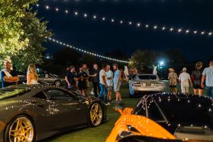 Guests enjoy WHEELS | WATCHES | WHISKEY® at The Stella Hotel