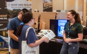 Attendees talking to ADU companies at BAAE Spring 2026 2
