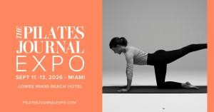 A Pilates instructor on a Pilates mat
