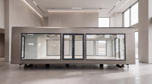 Pulse Container expandable pod side elevation shown before wrap with glazed front door | The Clear Idea