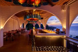 Casa Boho restaurant at sunset overlooking Kamala Bay.