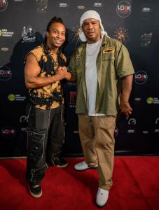 Fik Shun (Dushaunt Stegall) and Zarian Hadley on the red carpet at the DAT BOI Experience.