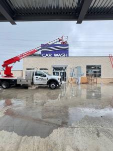 Installation process at White Water Express Car Wash