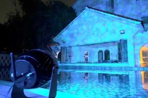 BLHW10 Outdoor Projector Illuminating A Poolside Facade