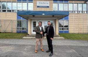 Rahul Rasal of UpSolv and Stéphane Trépanier of NexKemia shaking hands outside NexKemia’s Mansonville, Quebec facility.