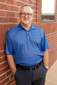 Bruce Porter Photo in front of his building at The Resource Center