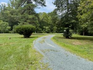 3 BR/1.5 BA Cape Cod-style home w/walk-out basement on 2.15 +/- acres minutes from historic downtown Gordonsville, VA (Louisa County) •	The home measures 2,479 +/- gross sf. and features one bedroom and half bath on the main level and 2 bedrooms
