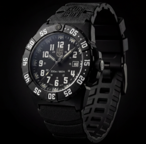 Luminox Navy SEAL 3500 Series watch with black dial, black rubber strap and rugged CARBONOX case and dive bezel against a dark background.