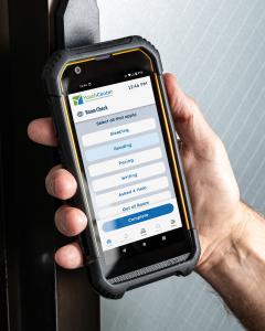 The YouthCenter SafeGuard device in use on a room check.