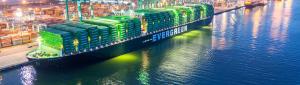 Evergreen ship in port with night lights