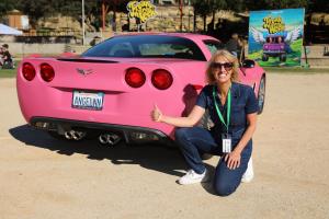 Amelia Dalgaard (aka Motorhead Mama) with Angelyne's iconic pink Corvette at the 2025 Freak of the Week Car Show.