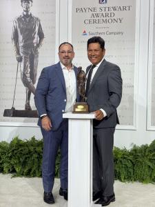 James Prendamano (left), founder and CEO of PreReal Investments, stands with Notah Begay III at the 2026 PGA TOUR Payne Stewart Award ceremony in Atlanta.
