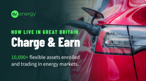The image shows an electric vehicle, with text saying "NOW LIVE IN GREAT BRITAIN, Charge & Earn. 10,000+ flexible assets enrolled and trading in energy markets."