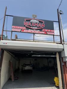 Storefront of Waxman of Tristate Auto Body & Collision Center on Bayview Ave, Jersey City