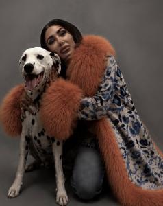 Photo of author Stevie Rae Hill, posing with her dalmation, King