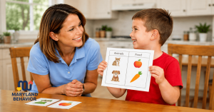 Child receiving in-home ABA therapy during a learning activity