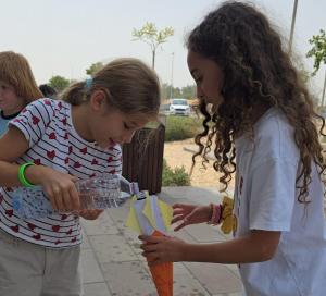Students building and testing a rocket during the Mind Base Education STEM Summer Program in Abu Dhabi.