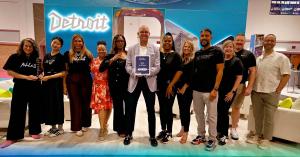 Visit Detroit team with their EXHIE Award