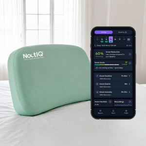 NoctIQ AI-Powered Anti-Snore System featuring the Smart Pillow and companion app on a bed.
