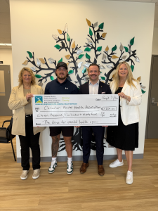 Cheque presentation of $11,584 to CMHA Simcoe County after the Drive for Mental Health Open charity golf tournament in Barrie, Ontario.