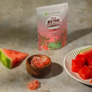 a photo of red gummies and watermelon