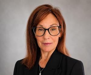 Photo of Claire Tamo, On Lok's new CFO