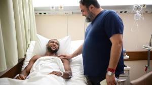two men in a hospital room