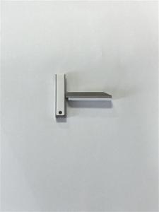 AMF jaw with white silicone finger pad attached to an RCD tong assembly