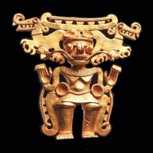 Cast gold Saurian pectoral deity pendant (Cocle, circa 800-1425 CE), its standing anthropomorph crowned by a headdress of two stylized alligators, 4¾ inches by 4¼ inches. Estimate: $75,000-$85,000