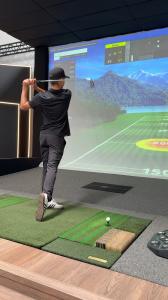 Swing data displayed on a Golf Envy simulator screen